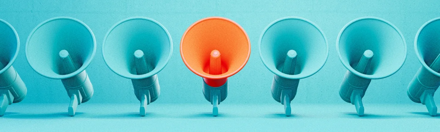 A line of bullhorns, with one standing apart from the rest. 