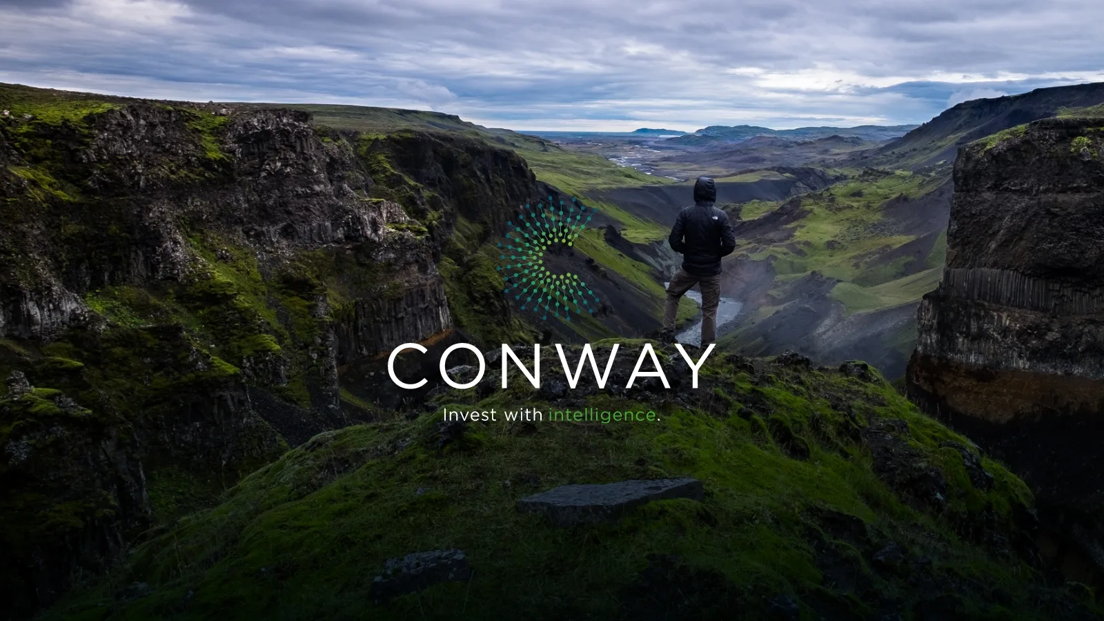 Conway Logo centered atop a mountain range with a hiker.